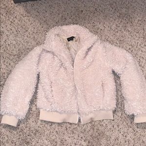 White/cream colored fleece jacket